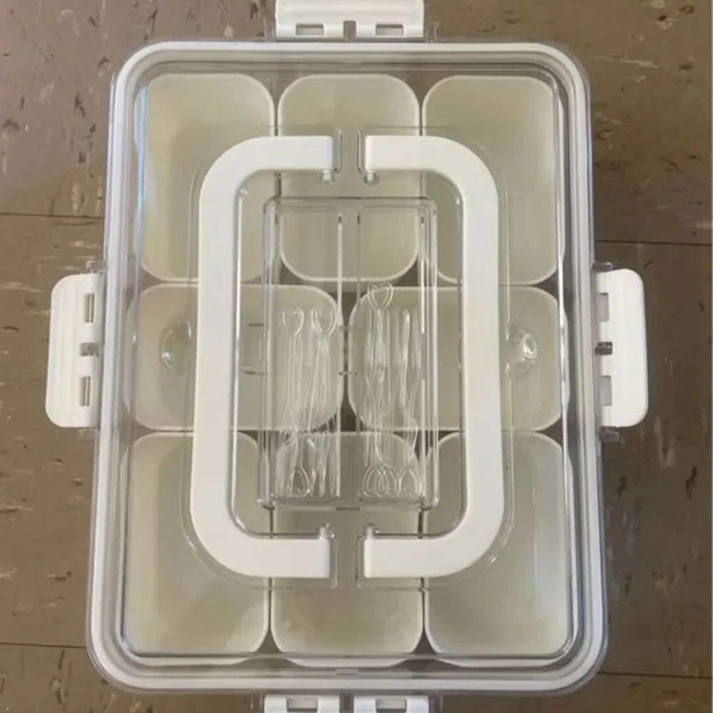 Portable Snackle Bento Box with 8 Compartments, Serving Picks, Lid, and Handles